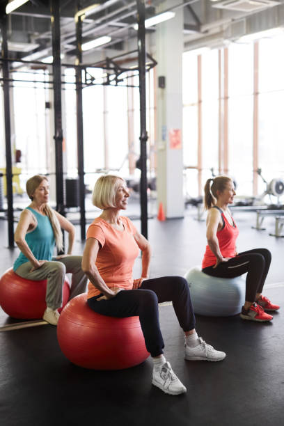 istock Mature Women Working Out in Gym 1176569728