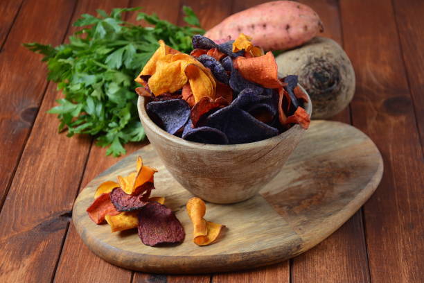 istock Baked vegetable chips purple sweet potato 1176571142