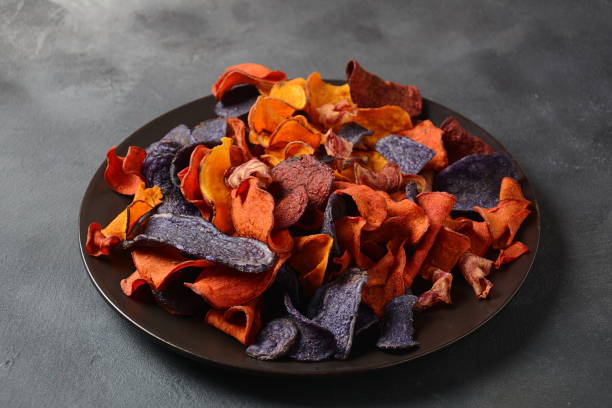 istock Baked vegetable chips purple sweet potato 1176571313