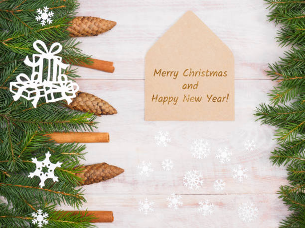 istock Fir tree branch with cinnamon, cones, snowflakes, present. Winter holidays concept 1176571548