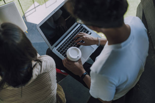 istock Man typing on keyboard of his laptop 1176571614