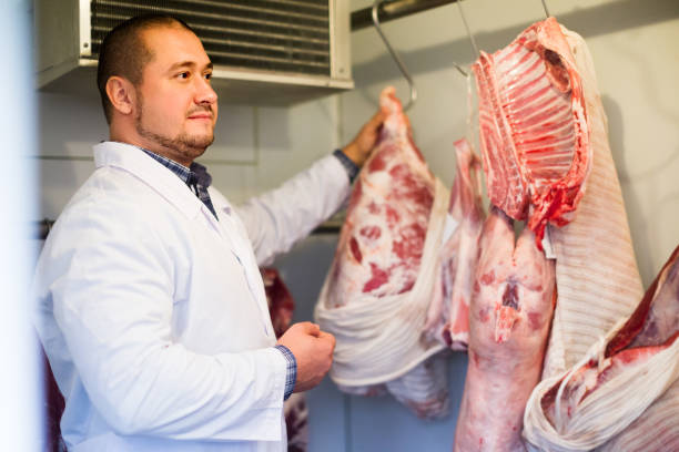 istock staff selling halal meat 1176572658