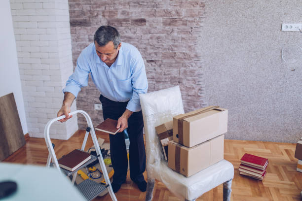istock An older married couple is moving into a new apartment 1176575951