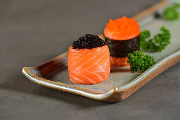 Sushi wrapped on salmon slice