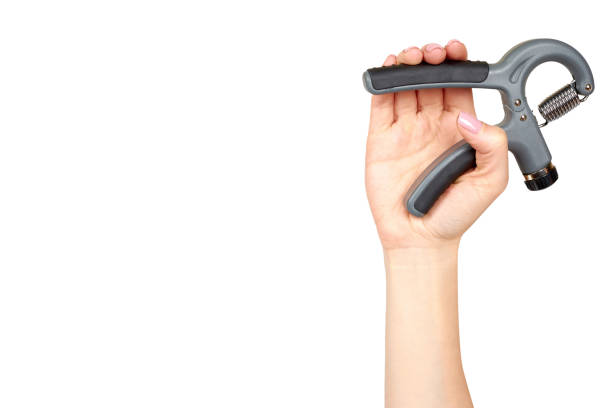 istock Hand with expander, sport equipment. Isolated background 1176576034