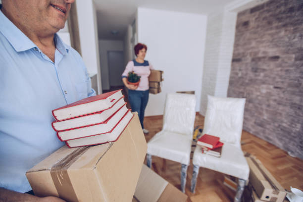 istock An older married couple is moving into a new apartment 1176576589