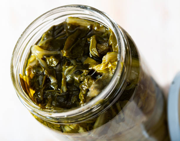 istock Glass jar with pickled swiss chard 1176576823