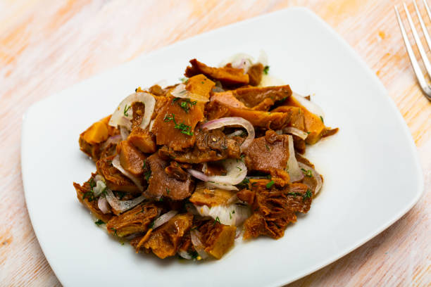 istock Pickled mushrooms with onions and dill 1176577047