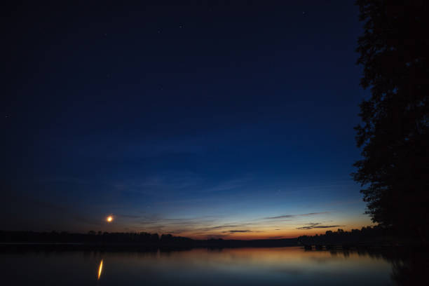 istock Night sky over the lake 1176581727