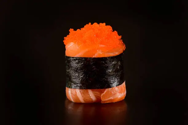Sushi wrapped on salmon slice