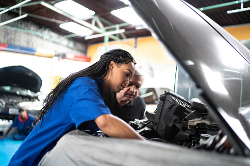 Mechanic partners in a auto repair shopu