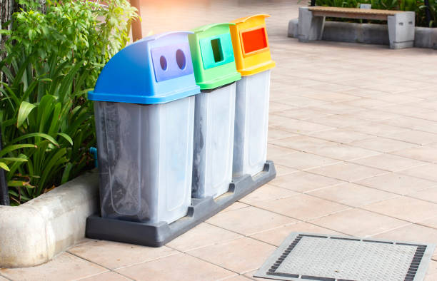 istock Plastic bins, yellow, blue, red, green. Separation of waste using color as the determination. 1176586084