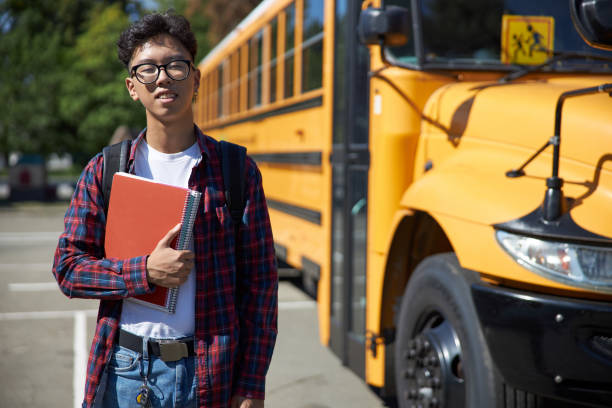 istock Young guy in glasses is staying outdoors 1176587737