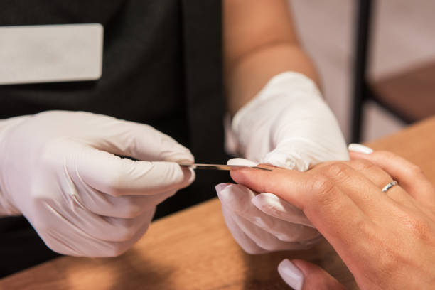 istock Woman in a nail salon 1176589430