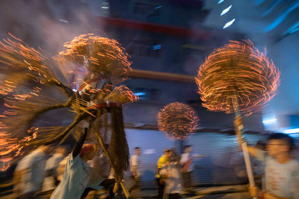 Tai Hang Fire Dragon Dance in Hong Kong during Mid-Autumn Festival September 12, 2019, Hong Kong: Inscribed to China's national list of Intangible Cultural Heritage in 2011, the Tai Hang Fire Dragon Dance began in 1880 and is a highlight of Mid-Autumn Festival in Hong Kong. hong kong moon night stock pictures, royalty-free photos & images