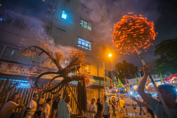 Tai Hang Fire Dragon Dance in Hong Kong during Mid-Autumn Festival September 12, 2019, Hong Kong: Inscribed to China's national list of Intangible Cultural Heritage in 2011, the Tai Hang Fire Dragon Dance began in 1880 and is a highlight of Mid-Autumn Festival in Hong Kong. hong kong moon night stock pictures, royalty-free photos & images