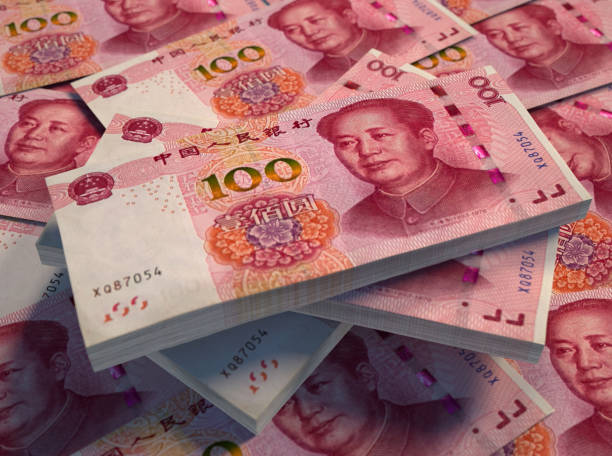 istock Chinese currency. 100 Chinese renminbi background. Macro 1176590882
