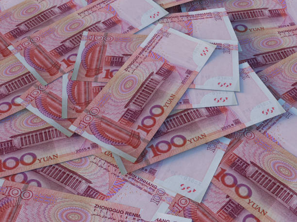 istock Chinese currency. 100 Chinese renminbi background. Macro 1176591029