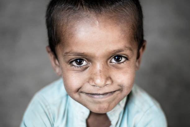 istock a young sick child suffering from cancer and still smiling 1176597002