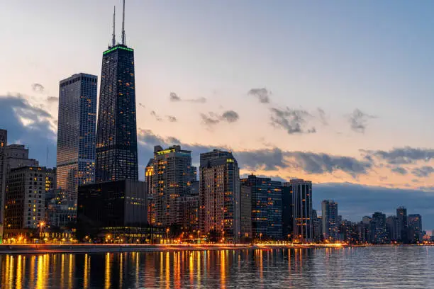 Photo of Chicago Cityscape river side at beautiful twilight time, Illinois, United States, USA, Business Architecture and building with tourist concept