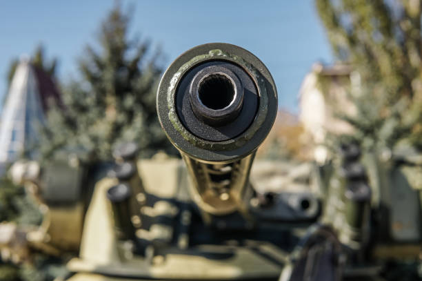 istock tank in position over city landscape 1176598922