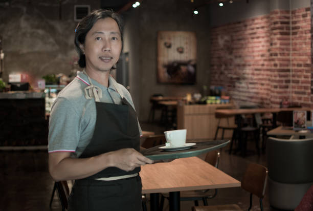 istock Mature Asian owner business start up 1176599839