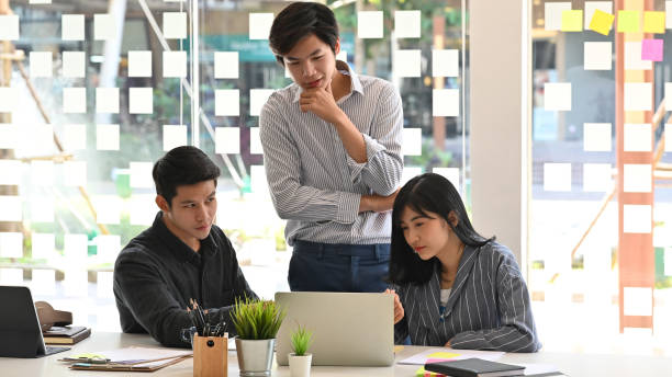 istock Startup concept, Team of young business analysis data in laptop computer. 1176600358