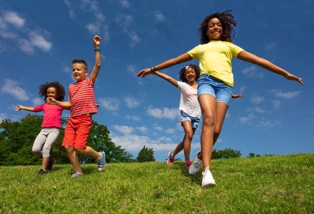 A group of diverse children playing outside.