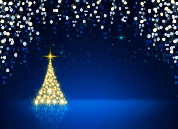 istock Golden Christmas tree isolated on blue sky background. 1176601056