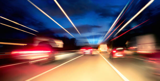 istock Driving on the highway at night 1176601697