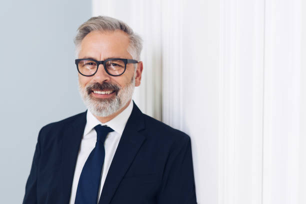 istock Happy middle-aged businessman wearing glasses 1176601858