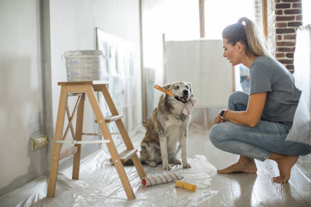 istock Woman doing diy project in apartment 1176604248