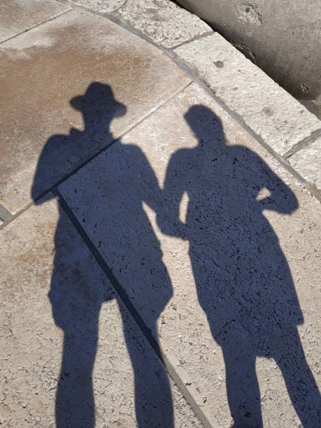 istock shadows of people 1176604934