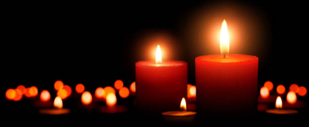 istock Advent candles, two flames in the foreground 1176605169