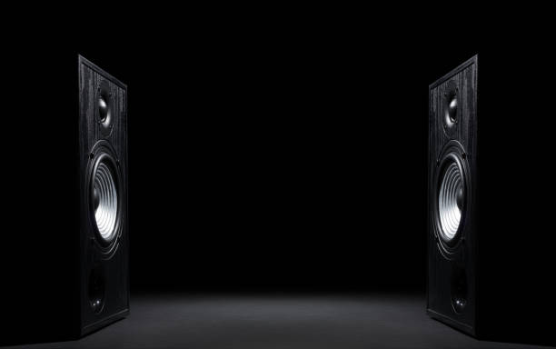 Two sound speakers on black Two sound speakers with free space between them on black  background. subwoofer photos stock pictures, royalty-free photos & images