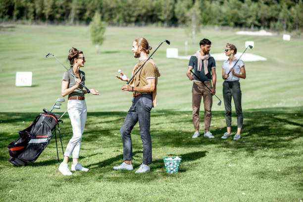 istock Young friends on the golf course 1176608482