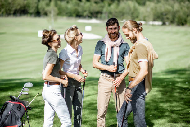 istock Young friends on the golf course 1176608560