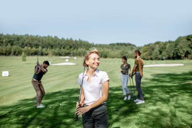 istock Woman with friends playing golf 1176608609