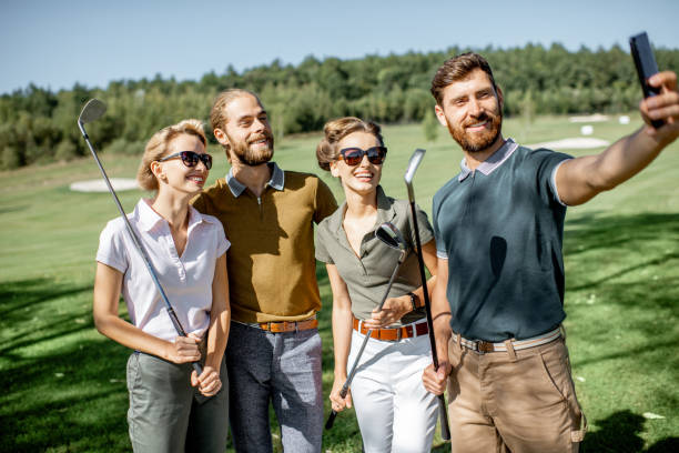 istock Friends making selfie photo on a golf course 1176608741