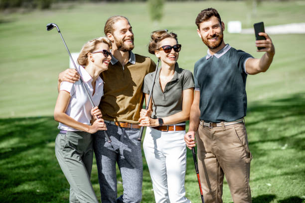 istock Friends making selfie photo on a golf course 1176608747