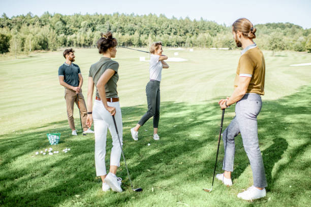 istock People playing golf outoors 1176608790