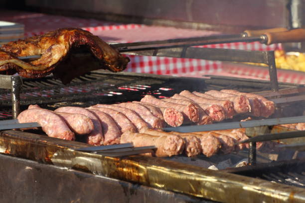 istock sausages strung on the spit and cooked on the hot coals 1176609985