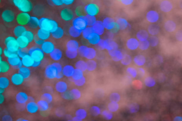 istock Colorful prism confetti blurred festive backdrop, trendy sparkles and glitter background, flat lay style. Christmas and holidays concept 1176610213