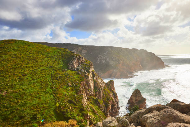 istock Cabo da Roca, Portugal. Lighthouse and cliffs over Atlantic Ocean, the most westerly point of the European mainland. 1176612650