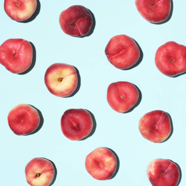 istock Peaches pattern on pastel blue background. Frame made of fresh fruits. Flat lay, top view, copy space. Vegan and vegetarian diet 1176612926