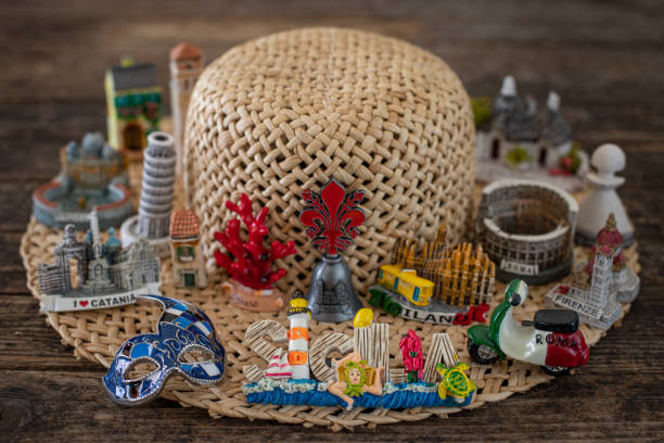 Many souvenirs from Italy on the wooden table, vacation concept Vacation concept with souvenirs amalfi coast map stock pictures, royalty-free photos & images