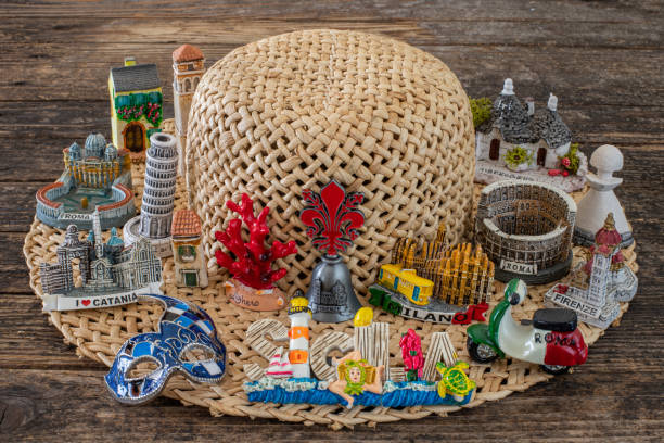 Many souvenirs from Italy on the wooden table, vacation concept Vacation concept with souvenirs amalfi coast map stock pictures, royalty-free photos & images