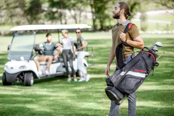 istock Man with golf bag on the playing course 1176615405