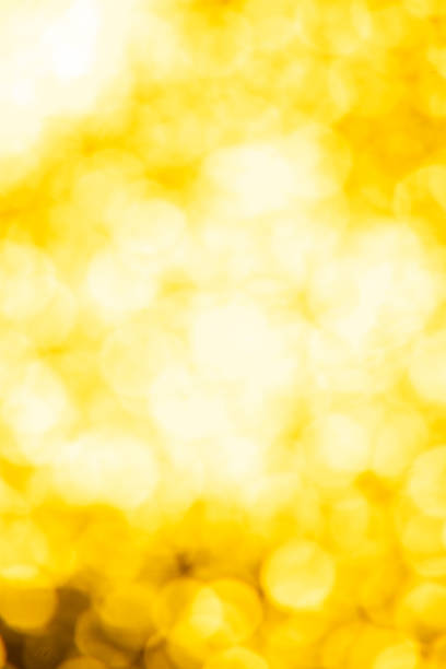 istock Golden glitter festive background with bokeh lights. Celebration concept for New Year, Christmas Holidays 1176615962