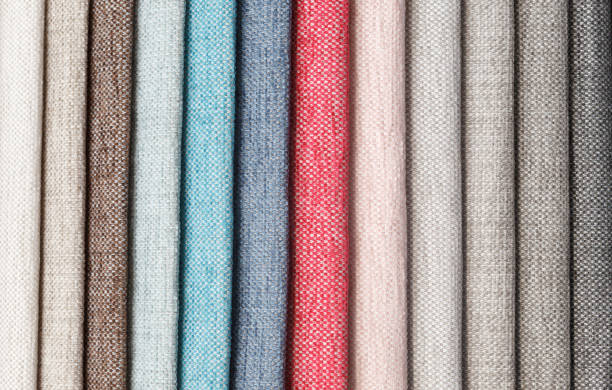 istock Multi-colored samples of upholstery fabric for sofas and chairs close-up. 1176616363